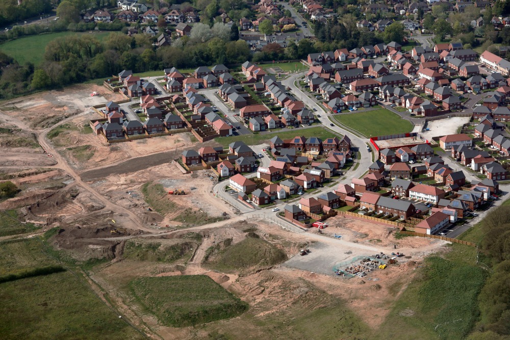 Aerial,View,Of,New,Houses,Under,Construction,In,The,Uk