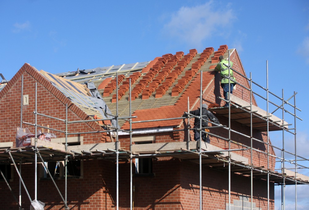Construction,And,Roof,In,Progress,Being, Builty. To,New,House,In,Uk, New houses being built
